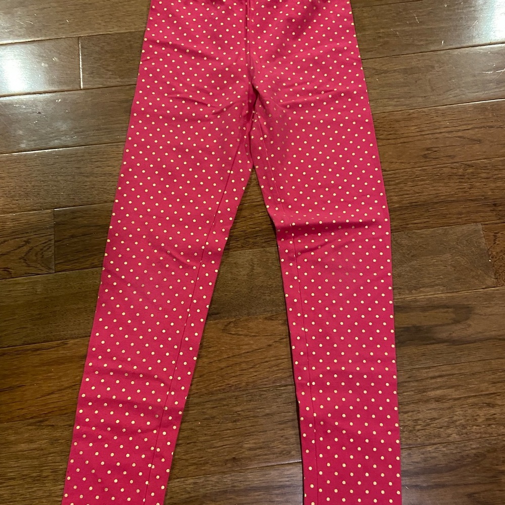 Old Navy girls leggings in hot pink with gold dots. Size L (10-12)